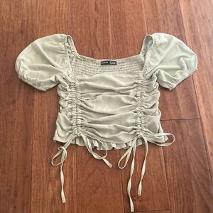 Light green scrunched top